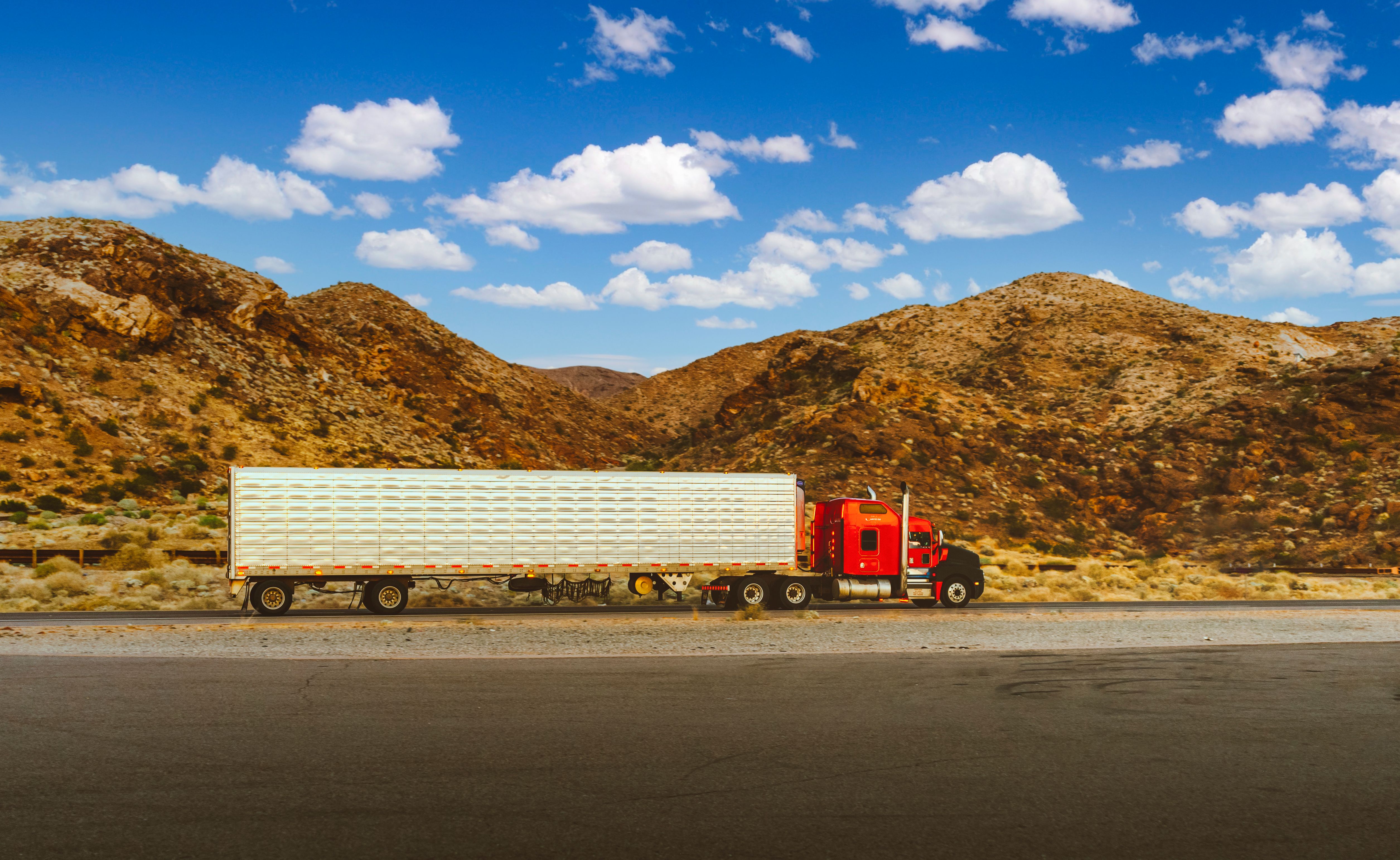 Truck delivering a steel building package to your site